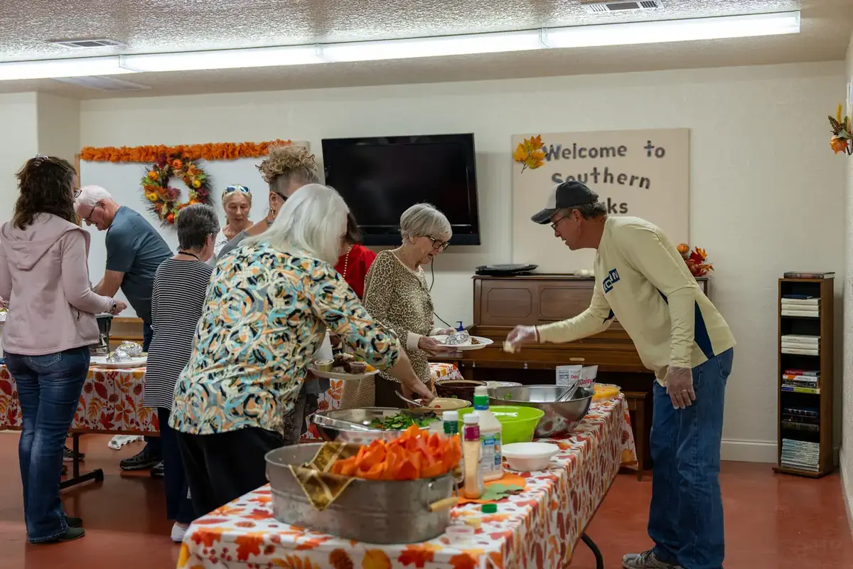 Volunteers preparing food in the church kitchen